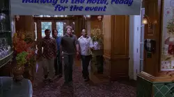 Paul Rudd and Romany Malco walking down the hallway of the hotel, ready for the event meme