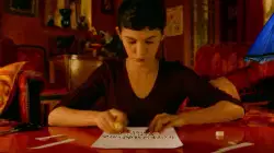 Amelie Writes Letter And Shows Paper 