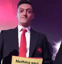 Nothing says 'Go Arsenal!' like a tux and a yellow card meme