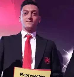 Representing the Arsenal with a yellow card and necktie meme