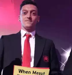 When Mesut Özil shows up to the game in a tuxedo meme