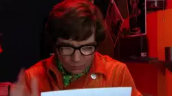 Austin Powers Looks At Photo Of Himself 