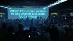 When the other people in the crowd are calm, but serious meme