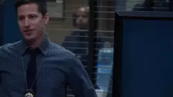 Andy Samberg trying to control the TV screen like a pro meme