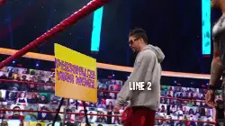 Wrestler Bad Bunny Pushes Over Sign 