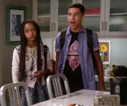 When Yara Shahidi and Marcus Scribner are talking and holding a poster board meme