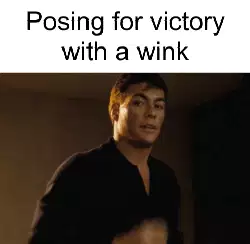 Posing for victory with a wink meme