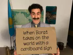 When Borat takes on the world with a cardboard sign meme