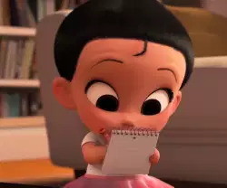 Little Girl Writes On Notepad 