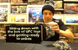 Sitting down with the box of UFC toys and getting ready to unbox meme