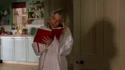 Blonde hair, white robe, decorations, kitchen fixtures, writing in a diary...where have I seen this before? meme