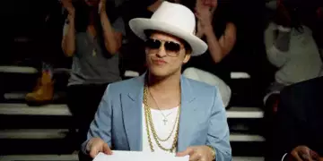 Bruno Mars is on fire and the audience is cheering him on meme