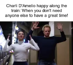 Charli D'Amelio happy along the train: When you don't need anyone else to have a great time! meme