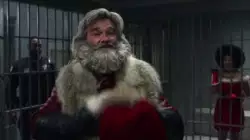 Kurt Russell and his Santa hat, ready for action meme
