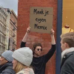 Dude With Sign Holds Up Sign 