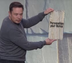Elon Musks Holds Wooden Board 