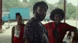 Donald Glover Points Excitedly To Someone 