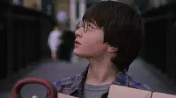 Harry Potter Looks At Train Ticket 