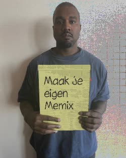 Kanye Holding Up Yellow Notebook Paper 