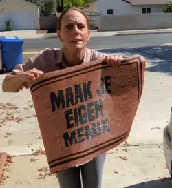 A Karen Holds Up A Mat
