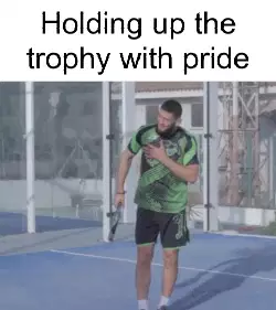 Holding up the trophy with pride meme