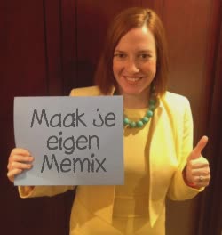 Jen Psaki Holds Up A Sign 