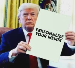 Trump Holds Up Piece Of Paper 