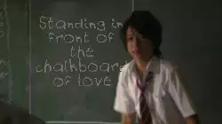 Standing in front of the chalkboard of love meme
