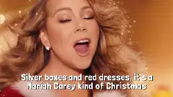 Silver boxes and red dresses, it's a Mariah Carey kind of Christmas meme