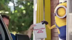 Minion Giving Food In Drive Through  