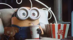 Excited and happy, the Minions and their popcorn are ready for a movie night meme