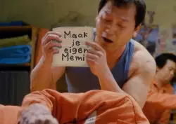 Man Shows Piece Paper To Friend 