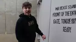 Mr Beast stands in front of the entrance gate, tongue out and ready meme