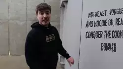 Mr Beast, tongue out and hoodie on, ready to conquer the doomsday bunker meme