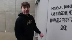 Mr Beast, tongue out and hoodie on, moving towards the entrance door meme