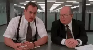 Two Men Talking In Office Space 