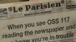 When you see OSS 117 reading the newspaper and you know you're in trouble meme