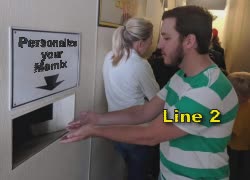 Man Points To Sign Over Garbage 