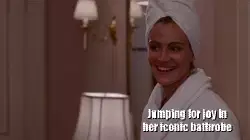 Jumping for joy in her iconic bathrobe meme