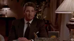 Richard Gere Sitting At Dinner Table 