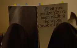 When you realize you've been reading the wrong book all along meme