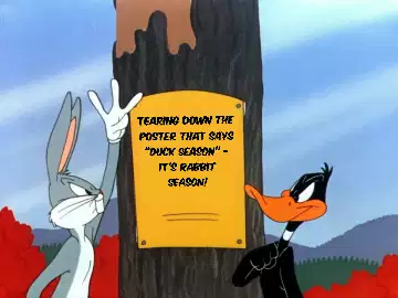 Tearing down the poster that says "Duck Season" - it's Rabbit Season! meme