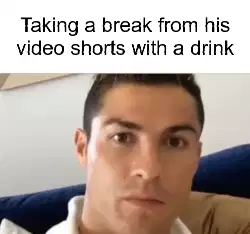Taking a break from his video shorts with a drink meme