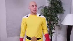 Man in Pikachu Costume Looks Down 