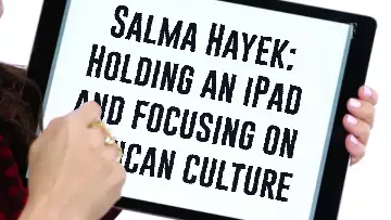 Salma Hayek: Holding an iPad and focusing on Mexican culture meme
