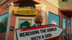 Reaching the world with a sign meme