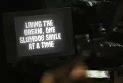 Living the dream, one slumdog smile at a time meme