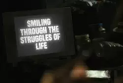 Smiling through the struggles of life meme
