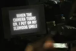 When the camera turns on, I put on my slumdog smile meme