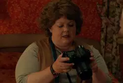 Melissa McCarthy Flips Through Camera 